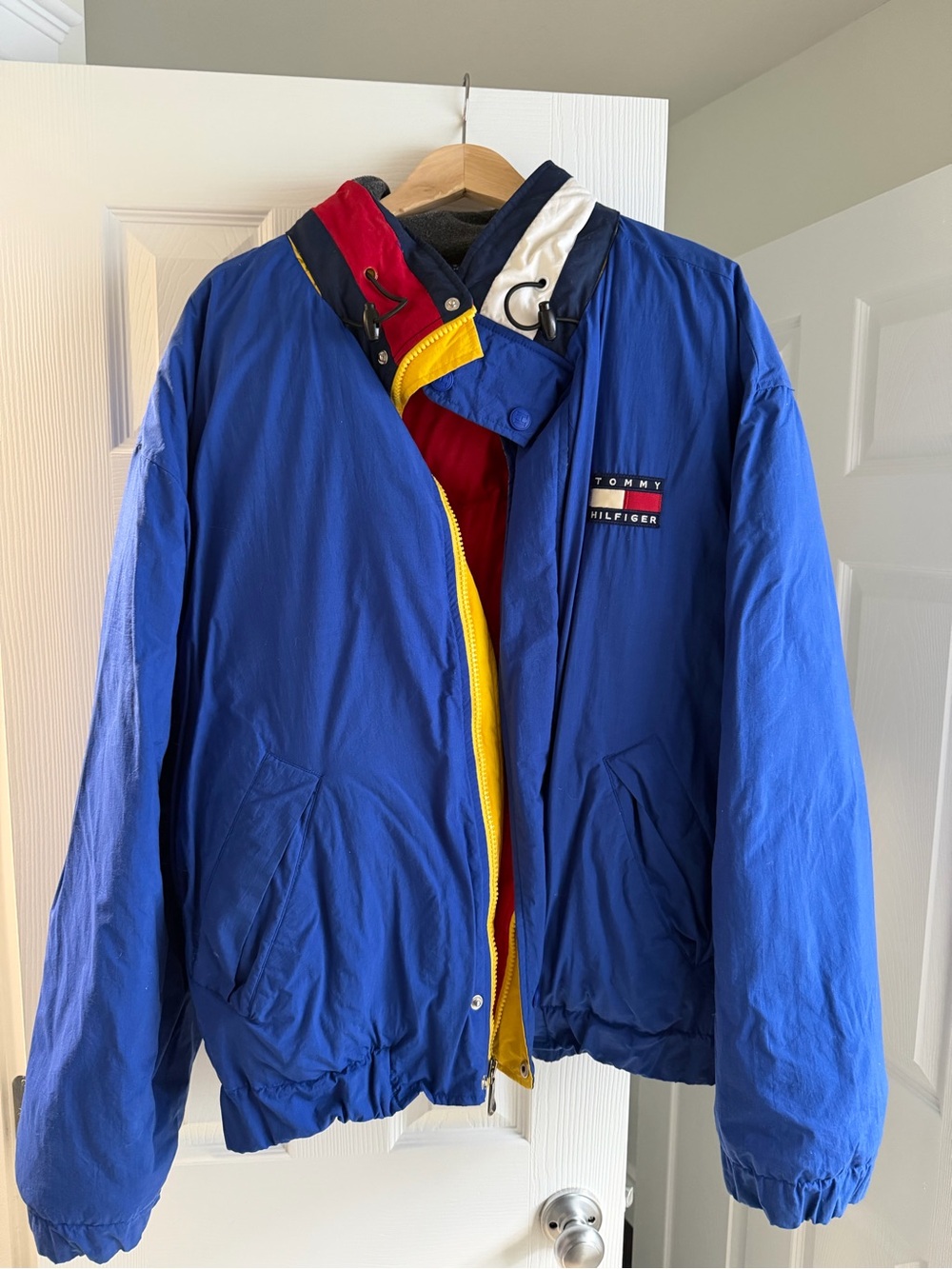 Tommy Hilfiger Royal Blue Bomber Jacket with Red & Yellow Accents